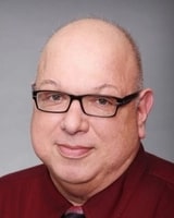 Fred_Winchar seen wearing a dark brown color frame specs